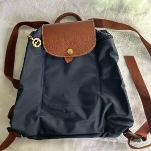 Long Champ Le Pliage original women’s back pack in good condition.